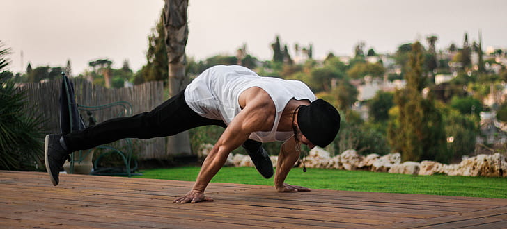 Photo By Przemek Klos, Young Man Doing Push-ups On A Red Rubber Ground  During His Workout In A Modern Calisthenics Street Workout Man Wearing